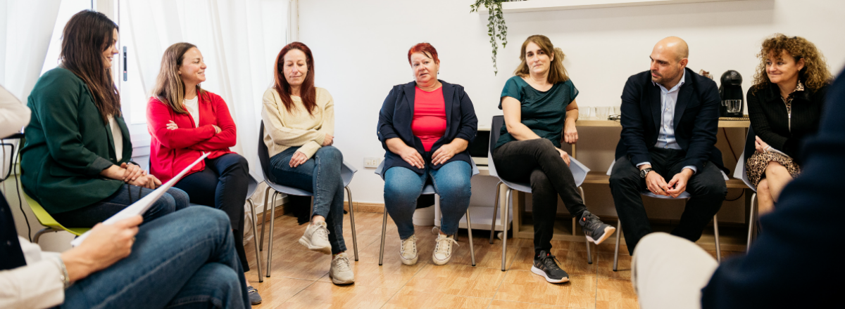 Members of the Fundacion-Integra Women's Academy chatting in a meeting