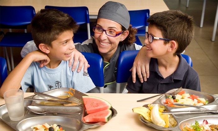 Children enjoying a catered meal