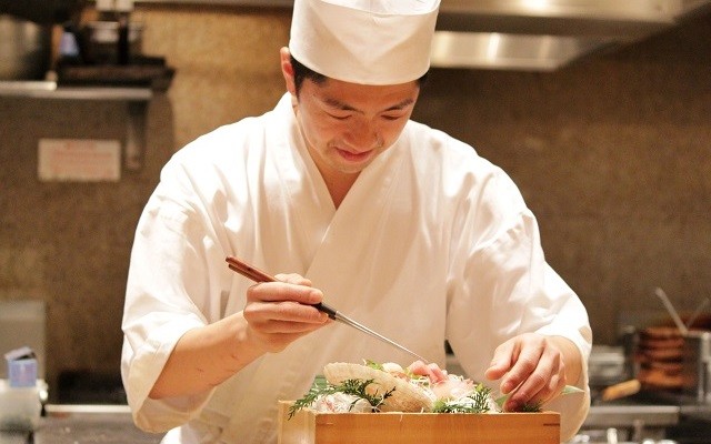 Make your mark in any of our 40 countries teaser image showing chef finalising a dish